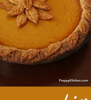A clipping of a pumpkin pie decorated with pie crust leaves.