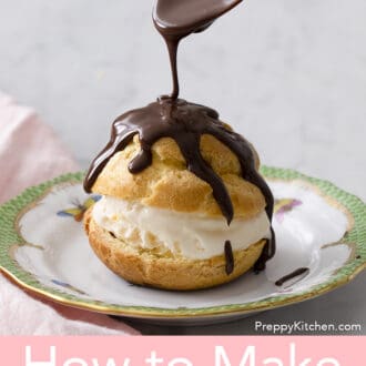 Pinterest graphic of a profiterole on a plate with chocolate drizzled over top.