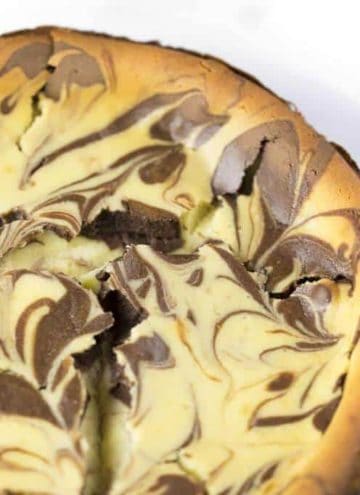 A photo of a Chocolate Marble Cheesecake.