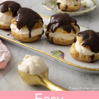 Pinterest graphic of profiteroles on a tray with a scoop of ice cream in front.