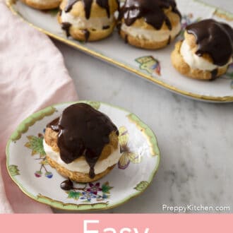 Pinterest graphic of a profiterole on a plate in front of a platter of four more.
