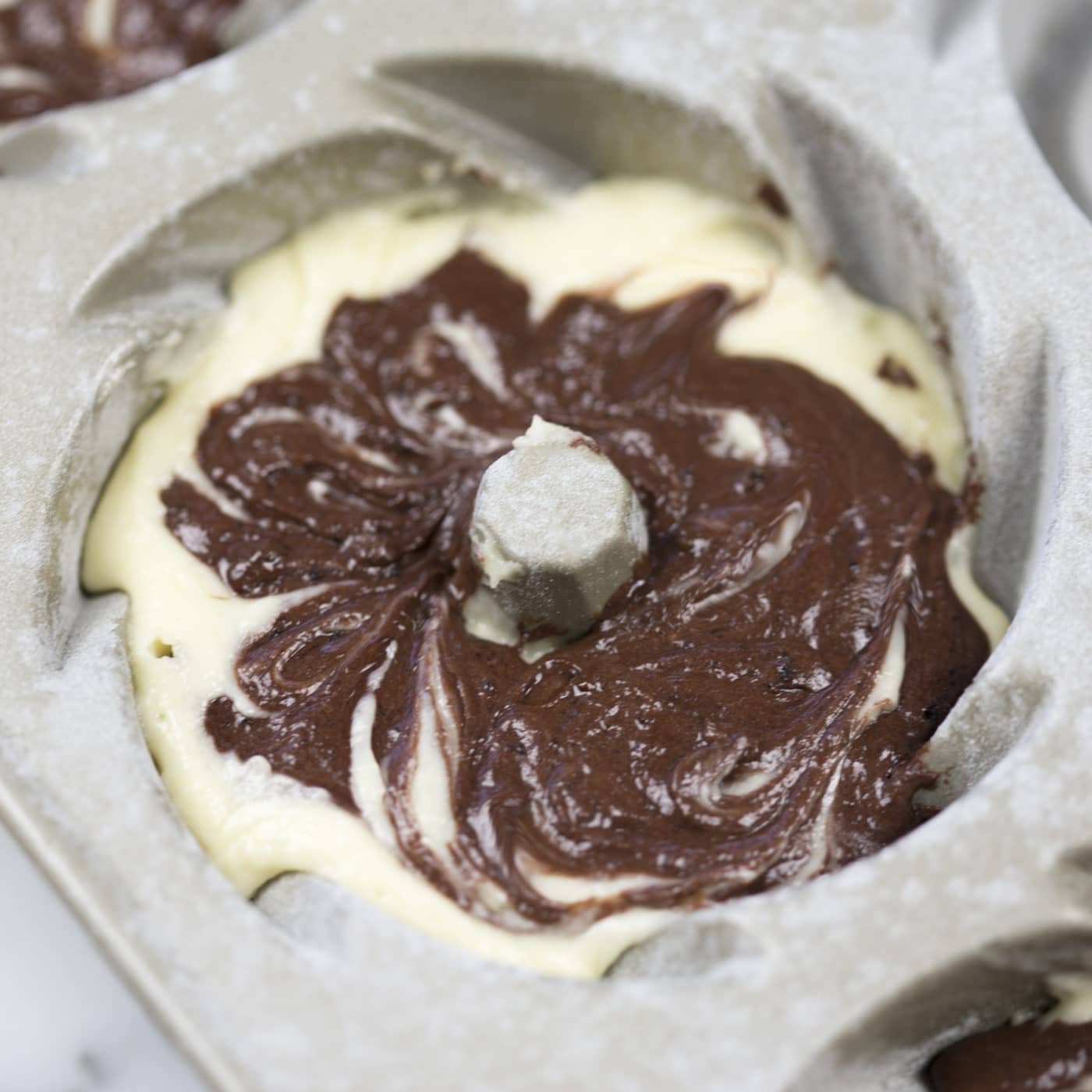 how high do you fill mini bundt pans 