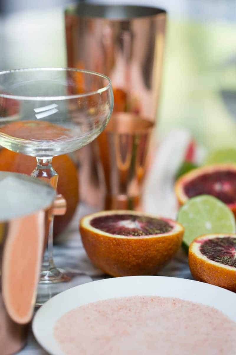 A photo of the ingredients to make a blood orange margarita.