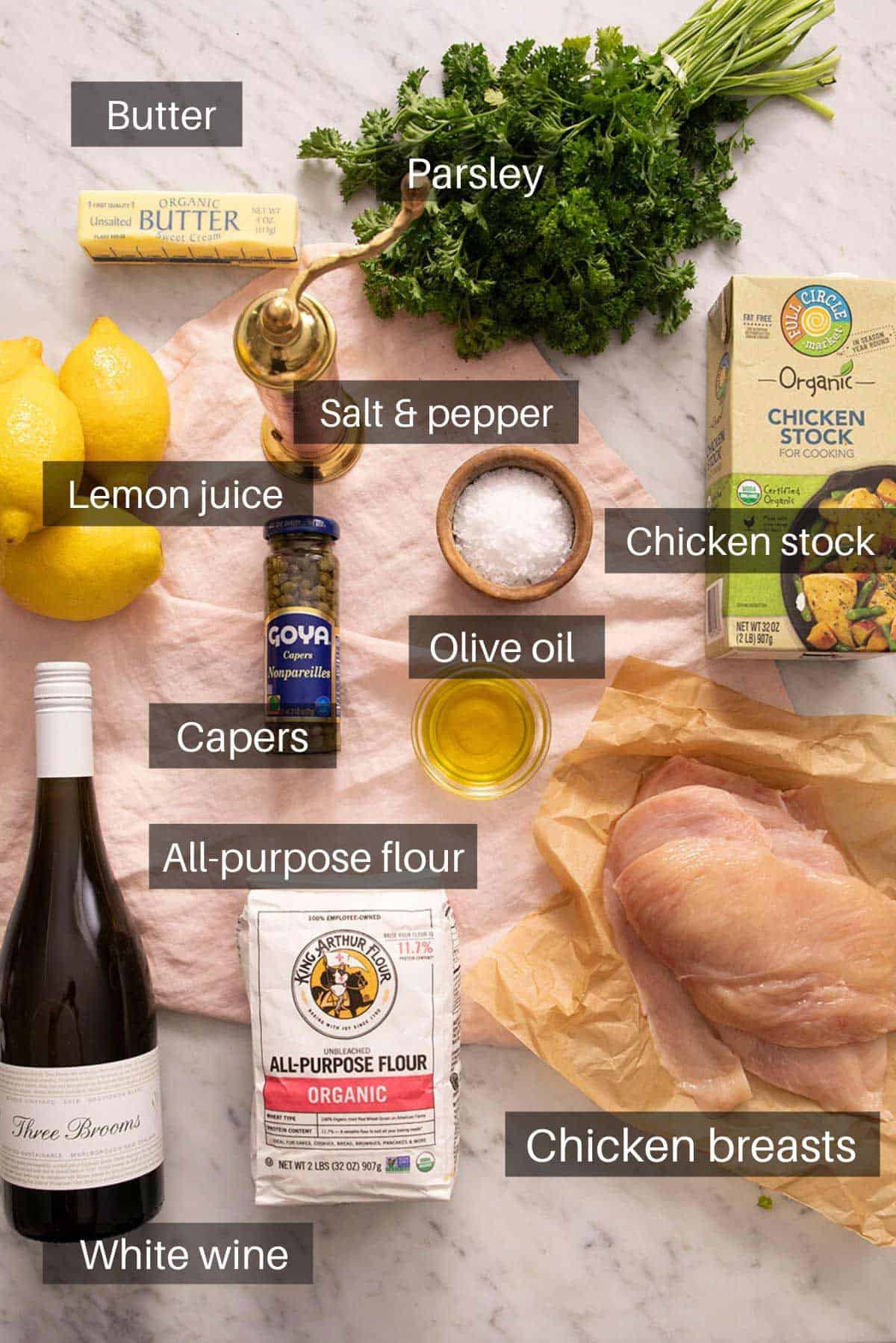 Ingredients needed to make chicken piccata.