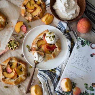 A Peach & Pistachio Galette on a plate.