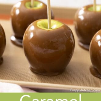 Pinterest graphic of multiple caramel apple on a silicone mat in a sheet pan.