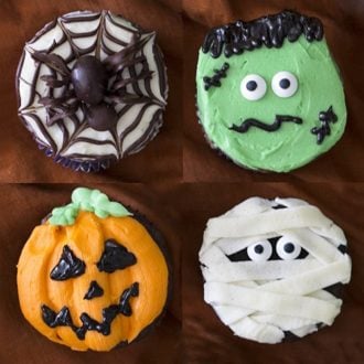 photo showing four different halloween cupcakes, mummy, frankenstein, jack o'lanterns and a spider on a web.