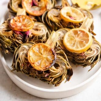 A close up of roasted artichokes