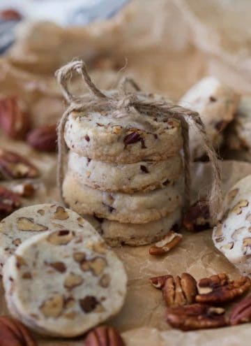 A photo of pecan shortbread cookies in a stack.