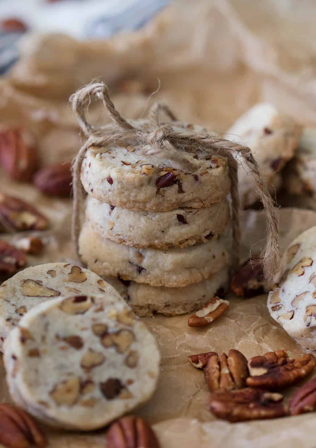A photo of pecan shortbread cookies in a stack.