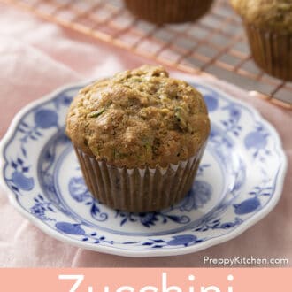 Zucchini muffin on blue and white plate