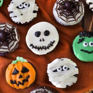 Overhead view of multiple Halloween themed cupcakes.