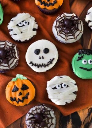 Overhead view of multiple Halloween themed cupcakes.