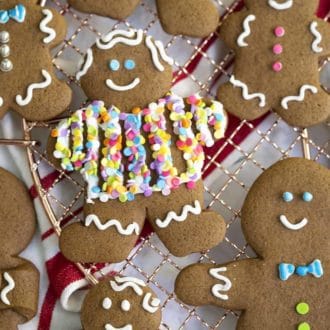 decorated gingerbread cookies on a cooling rack