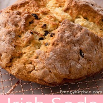 Pinterest graphic of a loaf of uncut Irish soda bread on a cooling rack.