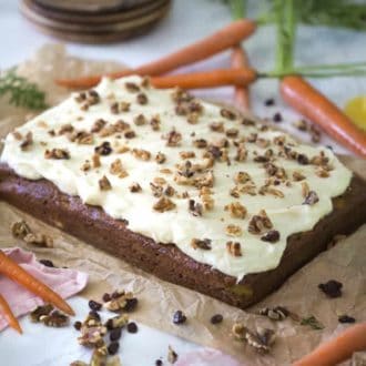 Carrot and Walnut Cake topped with toasted walnuts