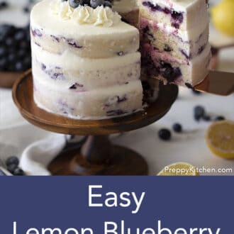 three layered lemon blueberry cake with white frosting