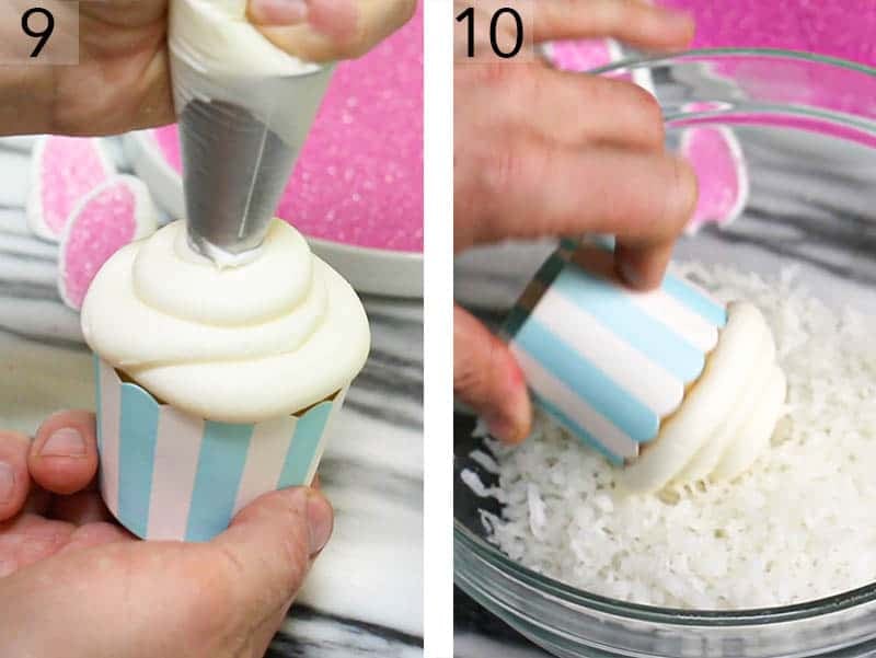 Cupcakes getting topped with buttercream then rolled in coconut.