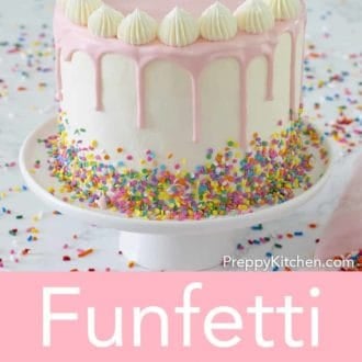 three layer funfetti cake with a pink drip and confetti sprinkles
