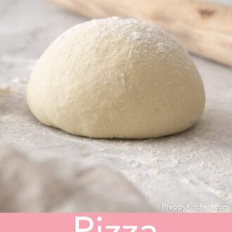 Pinterest graphic of pizza dough on a marble counter.