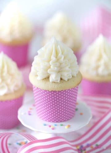 photo of moist Vanilla Cupcakes in pink paper wrappers