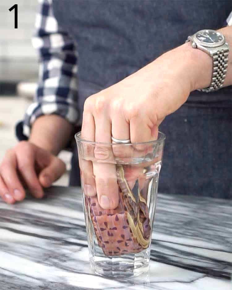 A fabric cake strip getting soaked in water.