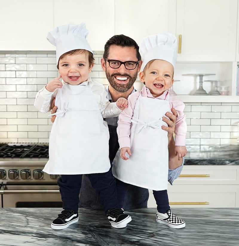 A photo of John with his twins Lachlan and George