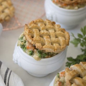 Photo of chicken pot pie with a lattice top made of pastry