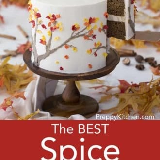 three layered spice cake on a wooden cake stand