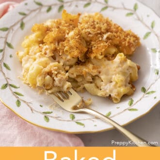 A plate of baked mac and cheese with a fork on it.