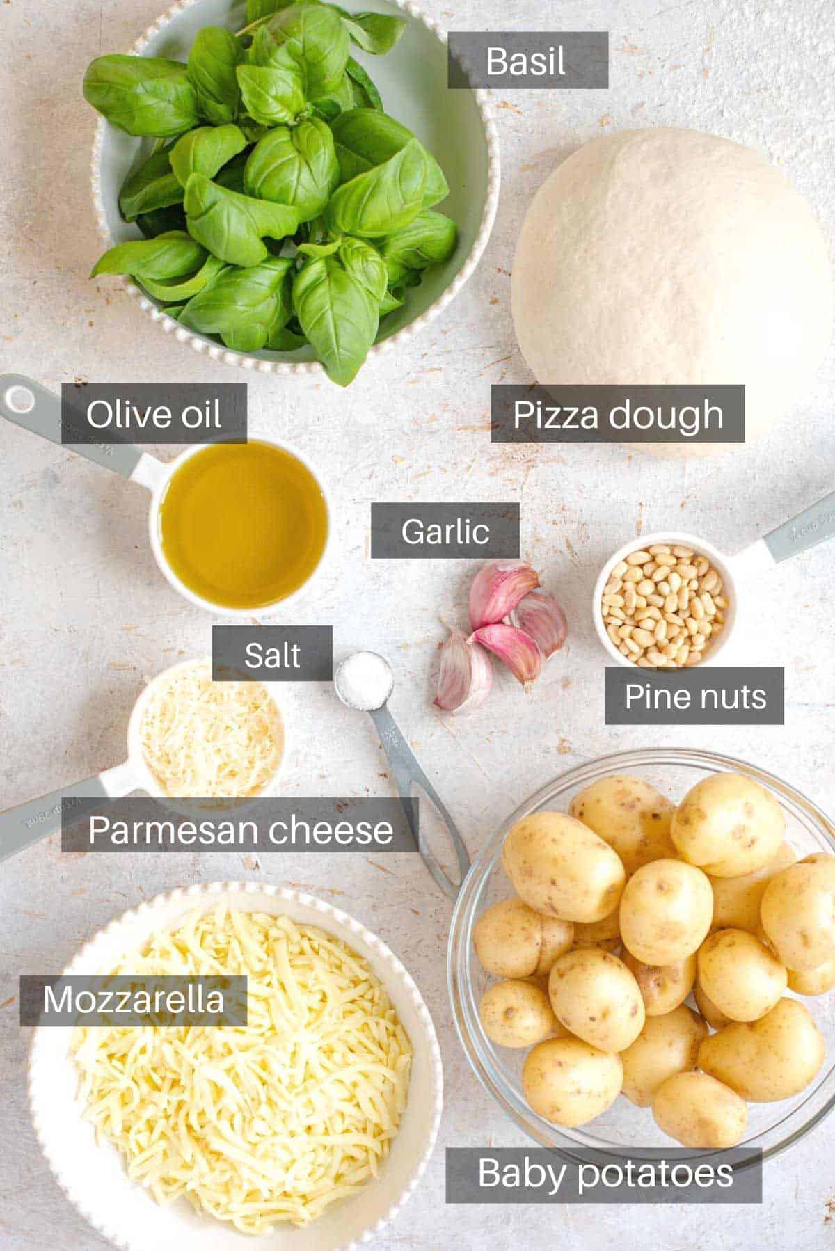 An overhead shot showing all the ingredients you need to make potato pizza