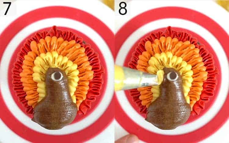 a buttercream turkey's eye and beak being added to the body