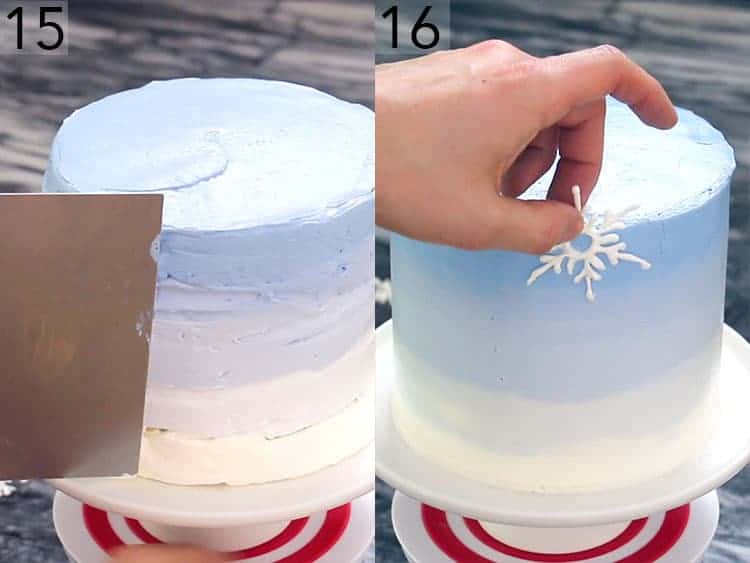 A blue ombré cake getting smoothed and covered with snowflakes.