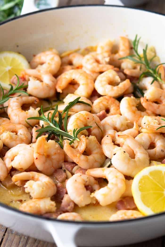 A photo of delicious garlic shrimp with crispy pancetta.