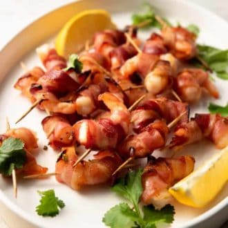 A square image of bacon wrapped shrimp