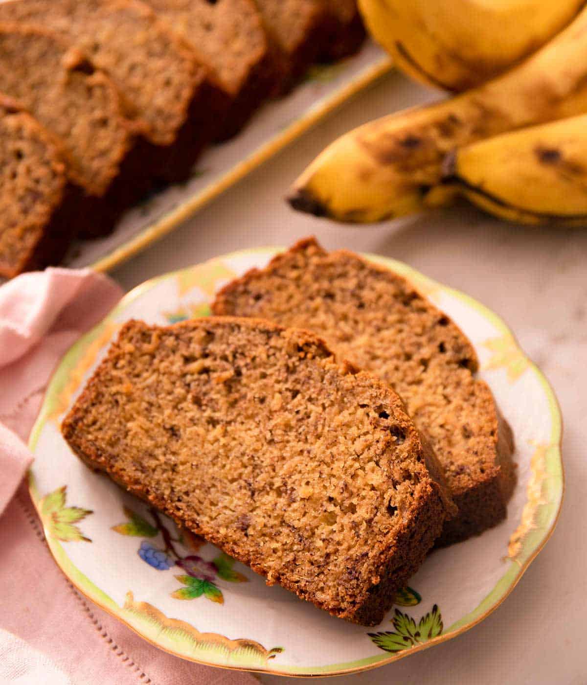 Two slices of banana bread on a plate