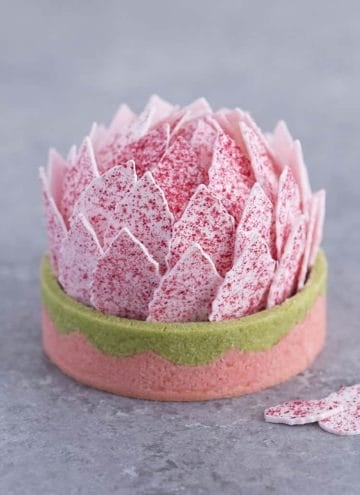 A lotus-shaped tart with strawberry flavored petals.