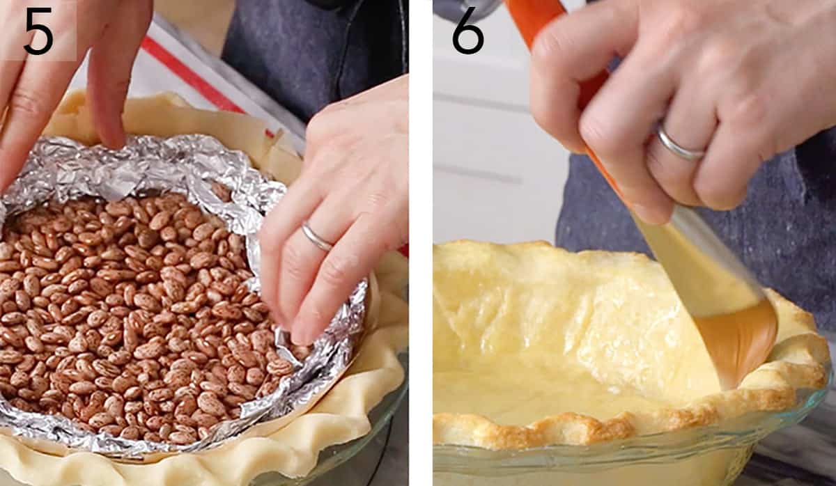 A butter crust being blind baked with pie weights.