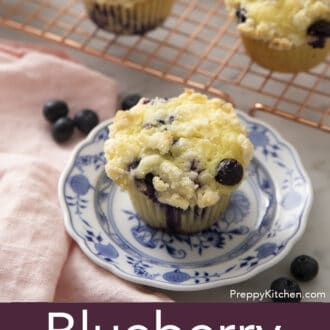 Blueberry Muffins next to a pink napkin.