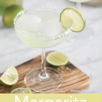 Margarita in a stemmed glass garnished with lime