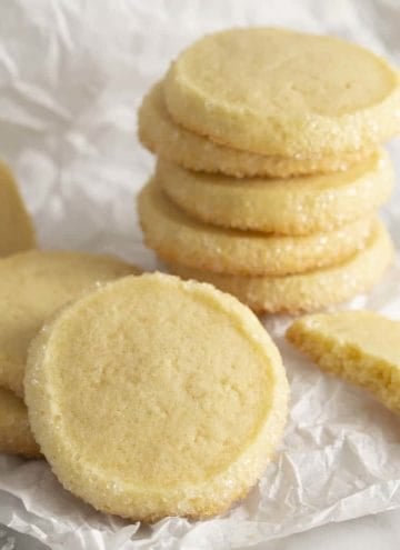 A group of butter cookies on parchment paper