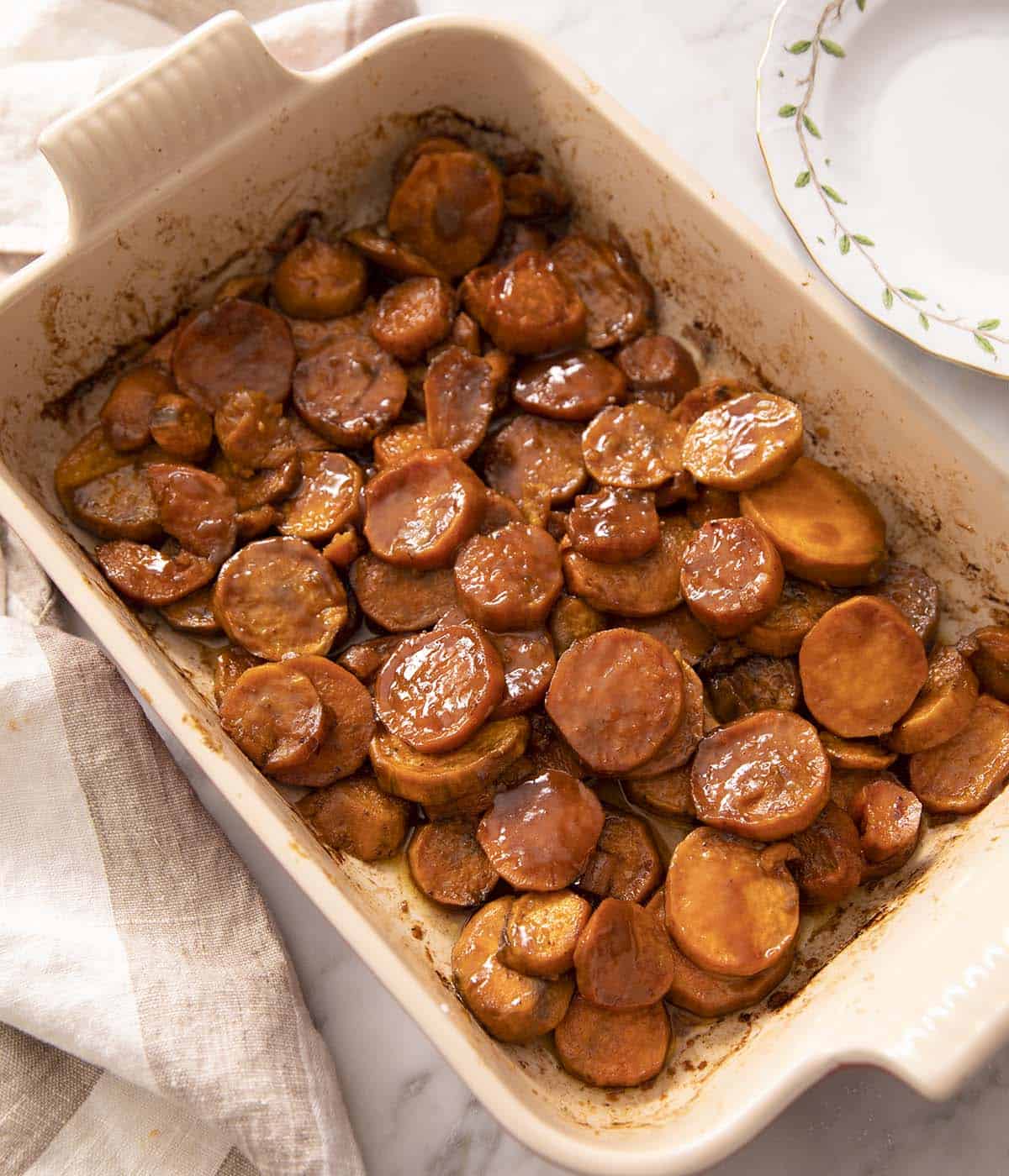 A baking dish filled with candied yams.