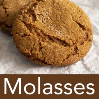 stack of molasses cookies on a parchment