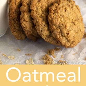 oatmeal cookies leaning on glass of milk