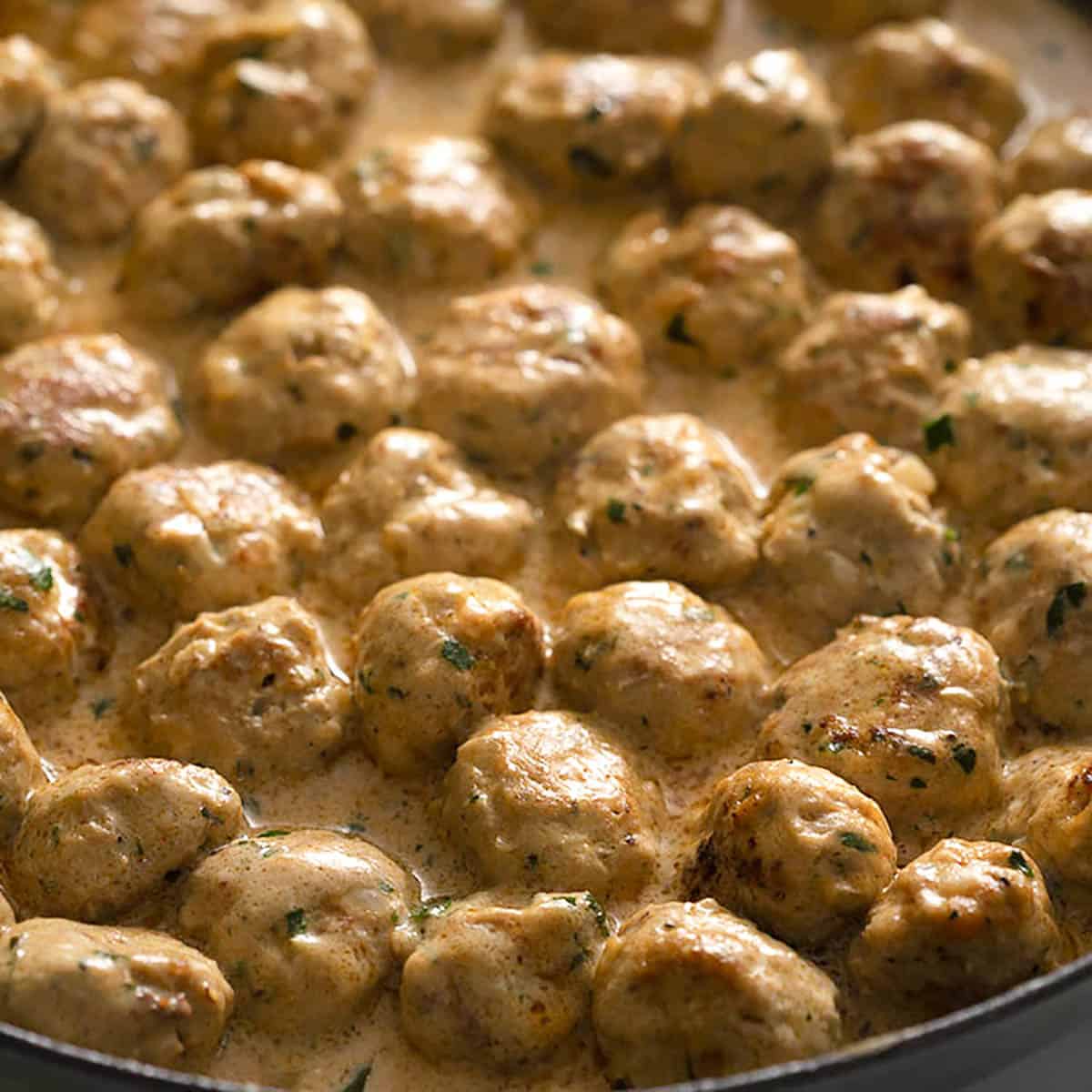 A large iron pan of Swedish meatballs