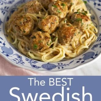 swedish meatballs and pasta on a blue and white plate