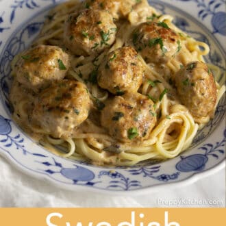 Swedish Meatballs over pasta on a plate
