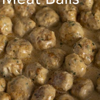Saucy Swedish Meatballs in a cast iron pan.