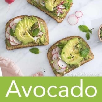 three pieces of avocado toast with various toppings on a counter