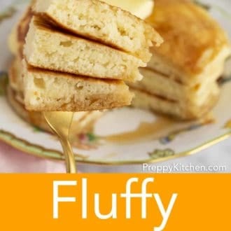 stack of fluffy pancakes on a plate topped with syrup